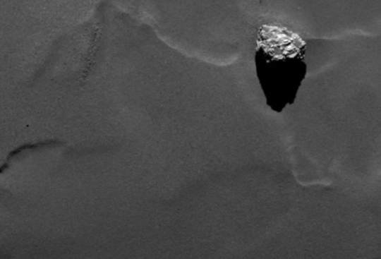 Close-up of the boulder Cheops as it casts a long shadow on the surface of comet 67P/Churyumov-Gerasimenko. Cheops has a size of approximately 45 meters and is the largest structure within an a group of boulders located on the lower side of the comet’s larger lobe. The image was obtained on September 19th by Rosetta’s scientific imaging system OSIRIS from a distance of 28.5 kilometers. One pixel in this image corresponds to 50 centimeters. <br /><br />