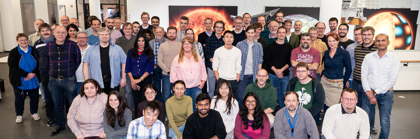 Group picture of the planetary science department in 2024. A group of about sixty people of various ages and genders, many of them appearing to be of european origin.