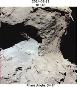 The neck of the comet reflects red light slightly less efficiently than its surroundings and thus appears bluish. This image shows the different reflectivities of different wavelengths in false colors, which for sake of elucidation exaggerate the visual effect. This images was prepared from images acquired on 22 August 2014 with a spatial resolution of 1.3 meters per pixel. <br /><br />