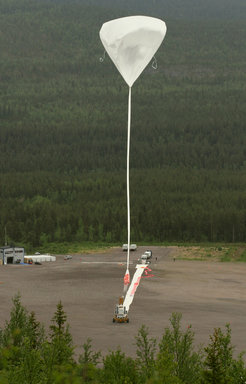 The balloon rises into the sky. Only when it is positioned exactly above the solar observatory, will the launching vehicle release its load.