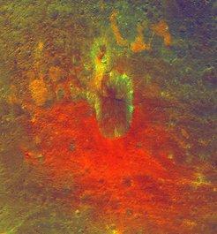 The reddish coloring below the crater either points to material that was hurled from Vesta’s interior during an impact or originated from the impactor itself.