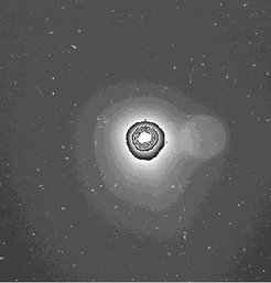 The coma of comet 67P/Churyumov-Gerasimenko as seen with OSIRIS covers an area of 150 kilometers across. This image was taken on July 25th, 2014 with an exposure time of 330 seconds. The hazy circular structure on the right and the center of the coma are artifacts due to overexposure of the nucleus.