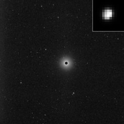 This image shows the first glimpse of the giant asteroid Vesta in front of a spectacular background of stars processed to show the true size of Vesta. It was obtained by the framing camera aboard Nasa's Dawn spacecraft on June 3, 2011, from a distance of about 1,2 million kilometers. Since Vesta is so bright that it outshines its starry background, the frmaing camera team commanded a lond exposure time to make the stars visible. They corrected the resulting exaggerated size of Vesta by superimposing a short exposure image of the target asteroid, showing its true size. Vesta is the small, bright pearl in the middle of the image. Vesta is 330 miles (530 kilometers) in diameter and the second most massive object in the asteroid belt. But, as the inset shows, Vesta is approximately five pixels accross in size in Dawn's early approach images.