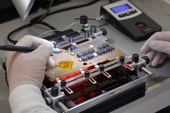 Soldering in the cleanroom area by means of pre-heating plate.