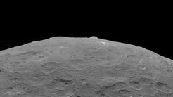 This photo of Ceres and one of its key landmarks, Ahuna Mons, was one of the last views Dawn transmitted before it completed its mission. This view, which faces south, was captured on Sept. 1 at an altitude of 2220 miles (3570 kilometers) as the spacecraft was ascending in its elliptical orbit.